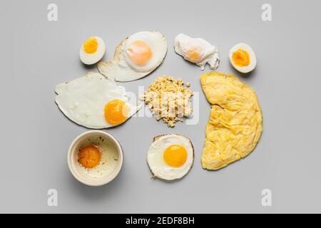 Set of different egg dishes on light background Stock Photo
