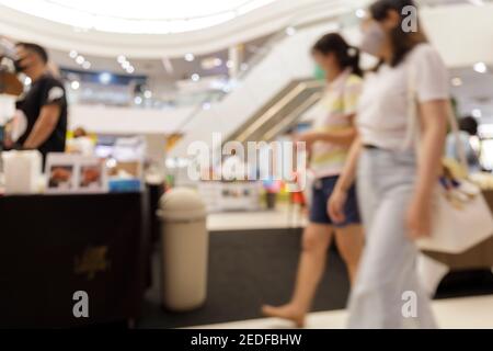 Blur or Defocus shopping mall background. Blur bokeh shopping mall background. Blur Department store for background. Abstract Shopping store with boke Stock Photo