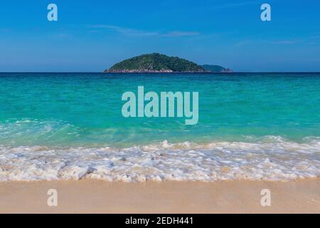 Tropical islands view of ocean blue sea wave water and white sand beach, nature landscape in Thailand Stock Photo