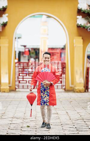 Vietnamese man in traditional clothes Stock Photo