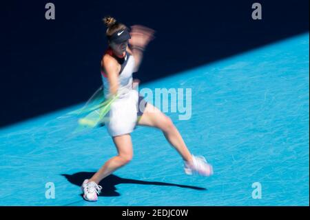 Melbourne, Australia. 15th Feb, 2021. Elina Svitolina of Ukraine hits a return during the women's single match against Jessica Pegula of the United States at Australian Open in Melbourne Park in Melbourne, Australia, Feb. 15, 2021. Credit: Hu Jingchen/Xinhua/Alamy Live News Stock Photo