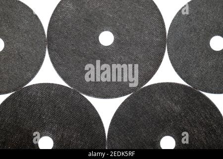 Abrasive black wheel, grinding disc , isolated on white background. Abrasive materials, discs, tools Stock Photo