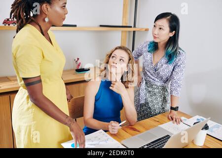 Businesswomen discussing project Stock Photo