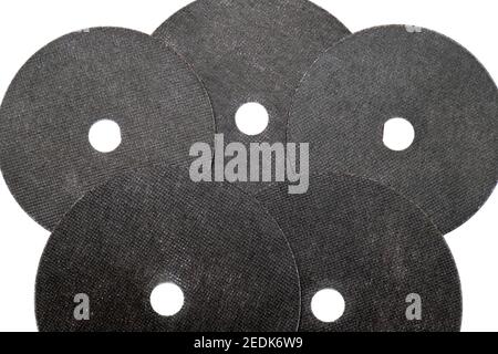 Abrasive black wheel, grinding disc , isolated on white background. Abrasive materials, discs, tools Stock Photo