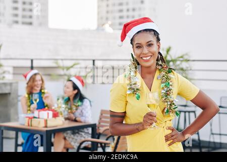 Celebrating Christmas with female friends Stock Photo
