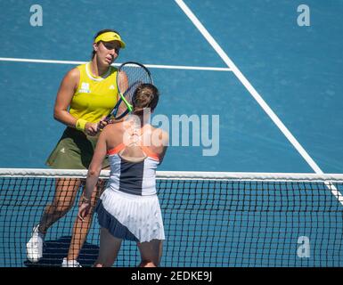 Melbourne, Australia. 15th Feb, 2021. Jessica Pegula (top) of the United States and Elina Svitolina of Ukraine greet each other at Australian Open in Melbourne Park in Melbourne, Australia, Feb. 15, 2021. Credit: Hu Jingchen/Xinhua/Alamy Live News Stock Photo