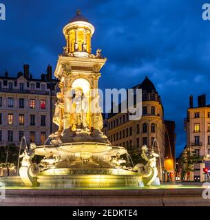 Illuminated fountain on the square of the  Jacobins in Lyon in the Rhone, France Stock Photo