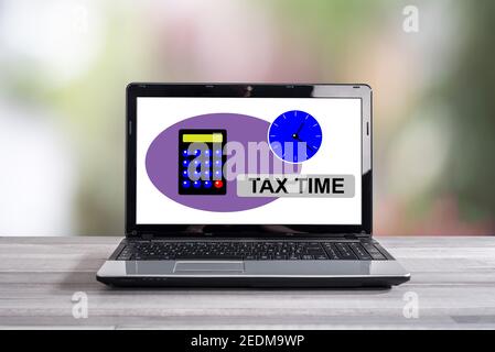 Tax time concept shown on a laptop screen Stock Photo