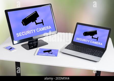 Security camera concept shown on different information technology devices Stock Photo