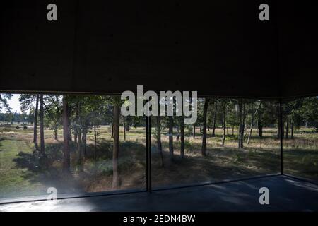 20.09.2020, Lohheide, Lower Saxony, Germany - Bergen-Belsen Memorial, view of the historical camp grounds from inside the Documentation Centre. More t Stock Photo