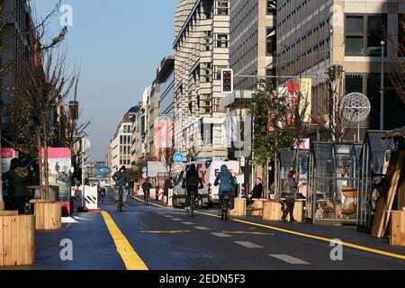 18.12.2020, Berlin, Berlin, Germany - The car-free section of Friedrichstrasse in Berlin-Mitte. Marked bicycle lanes run along the middle of the stree Stock Photo