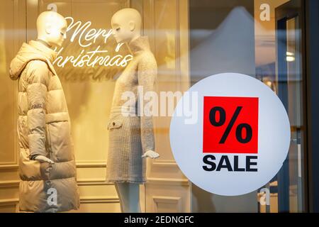 04.12.2020, Essen, North Rhine-Westphalia, Germany - Shop window of a fashion store at Christmas time with special offers.. 00X201204D002CAROEX.JPG [M Stock Photo