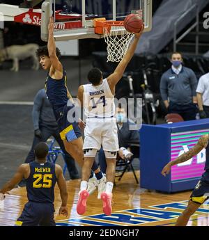 Marquette guard D.J. Carton (21) dribbles against North Carolina during the  second half of an NCAA college basketball game in Chapel Hill, N.C.,  Wednesday, Feb. 24, 2021. (AP Photo/Gerry Broome Stock Photo - Alamy