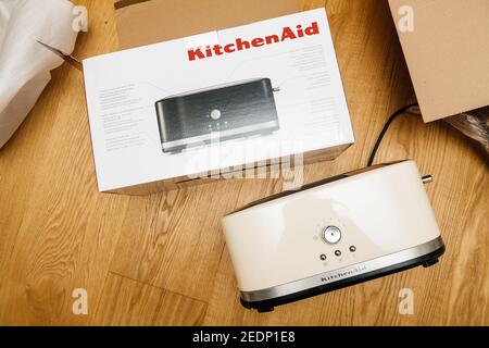 Paris, France - Feb 1, 2021: View from above of new KitchenAid 5KMT4116EAC toaster luxury product with 2 compartments long slices on the parquet wooden floor Stock Photo