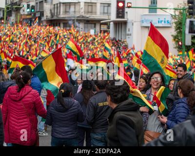 Protestors celebrate after the resignation of Bolivian president Evo Morales in La Paz, Bolivia, on November 10, 2019. Stock Photo
