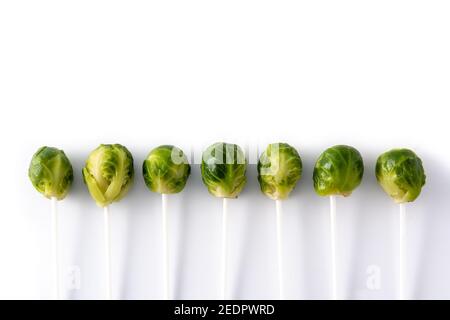 Set of brussel sprouts with lollipop sticks on white background Stock Photo
