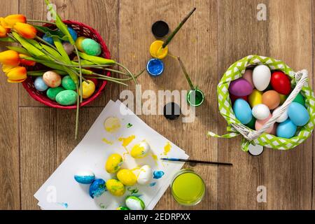 Happy Easter! Painting Easter eggs at home. Top view Stock Photo