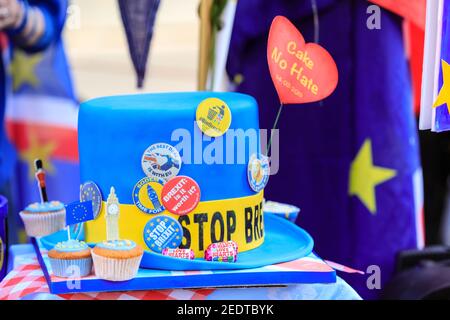 Stop Brexit top hat usually worn by activist Steve Bray, with buttons and stickers, Westminster, London, UK