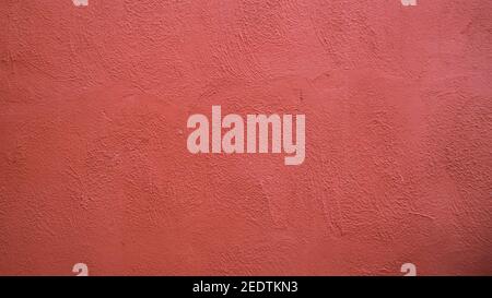 Abstract background from  red stucco concrete wall with sunlight, light and shadow Stock Photo