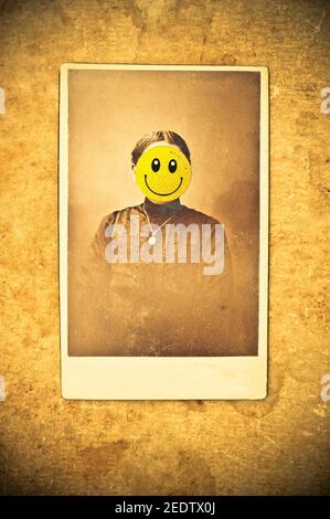 antique photo portrait of a woman with an emoticon covering her face Stock Photo