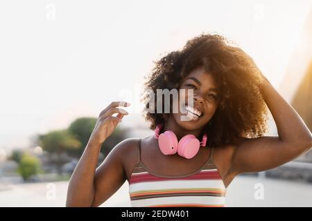 Happy african woman having fun smiling in front of camera Stock Photo