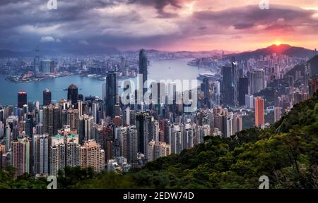 Hong Kong skyline at dramatic sunrise, Victoria harbour Stock Photo