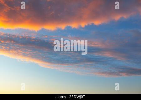 Pastel colored clouds on the morning sky Stock Photo