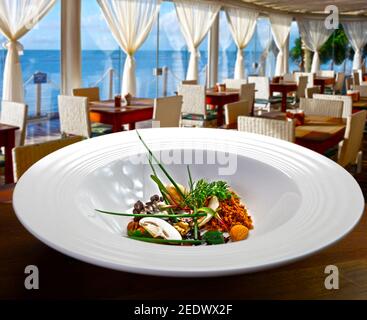 Haute cuisine at the beach restaurant Stock Photo