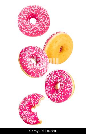 falling donuts set isolated on white background. Stock Photo