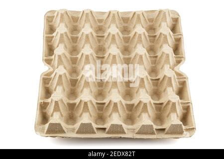 empty formed cardboard egg tray - closeup with edge-to-edge sharpness, isolated on white background. Stock Photo