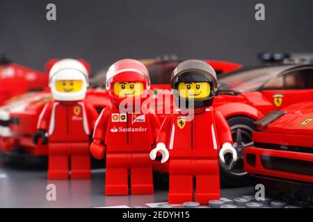 Tambov, Russian Federation - February 14, 2021 Lego driver minifigure  fixing wheel of white Porsche 911 GT by LEGO Speed Champions. Lego road  baseplat Stock Photo - Alamy