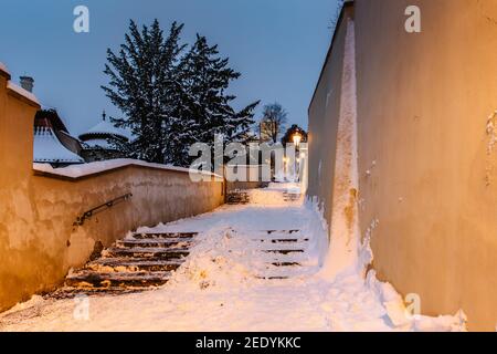 Old Castle Stairs at night, Prague, Czech Republic.Beautiful spectacular winter panorama of Vltava river and historical buildings.Romantic way up Stock Photo