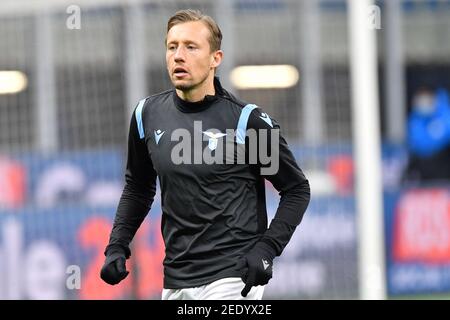 Milano, Italy. 14th Feb, 2021. Lucas Leiva of Lazio is warming up before the Serie A match between Inter Milan and Lazio at Giuseppe Meazza in Milano. (Photo Credit: Gonzales Photo/Alamy Live News Stock Photo