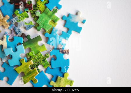 Puzzle. Background with half jigsaw puzzle and half white copy space for your text and design Stock Photo