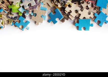 Puzzle. Background with half jigsaw puzzle and half white copy space for your text and design Stock Photo