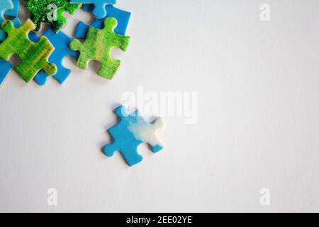 Puzzle. Background with half jigsaw puzzle and half white copy space for your text and design Stock Photo