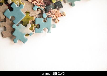 Puzzle. Background with half jigsaw puzzle and half white copy space for your text and design Stock Photo