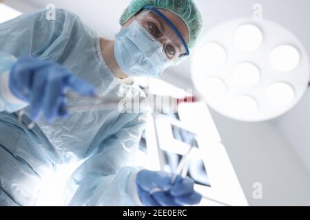 Surgeon female doctor in operating room portrait. Stock Photo