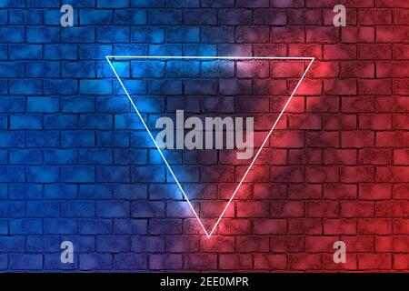 Neon triangle in the center.Red and blue neon light frame triangle in the center on brick wall background. Abstract dark background Stock Photo
