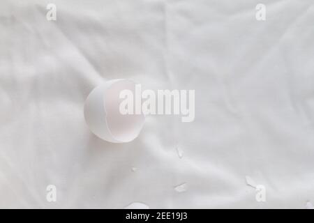 broken egg shell on white background with space for text, begging of life concept Stock Photo