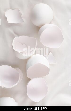 broken egg shell on white background with space for text, begging of life concept Stock Photo