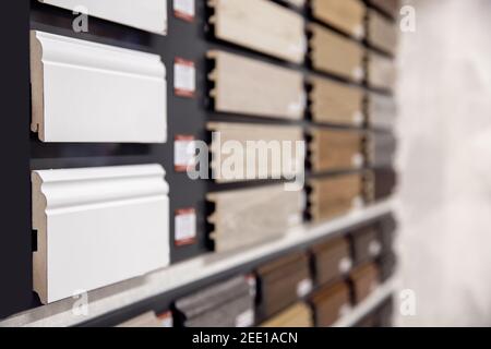 Set wood molding ceiling and floor skirting board on background. Stock Photo