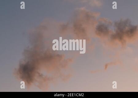 sunset sky with clouds, film grain effect Stock Photo