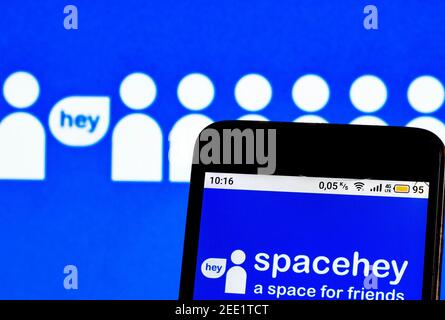 In this photo illustration, a SpaceHey logo seen displayed on a smartphone. Stock Photo