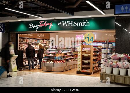 DUBLIN, IRELAND - Jan 11, 2020: The WHSmith store at Terminal 1, in Dublin Airport. Shop interior photo taken from the outside. Stock Photo