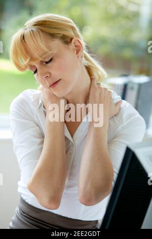 Woman with neck ache Stock Photo