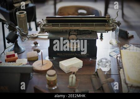 An antique Royal manual typewriter on a desk. Stock Photo