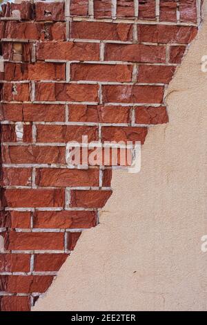 Red Brick Wall with Cracks Stock Photo