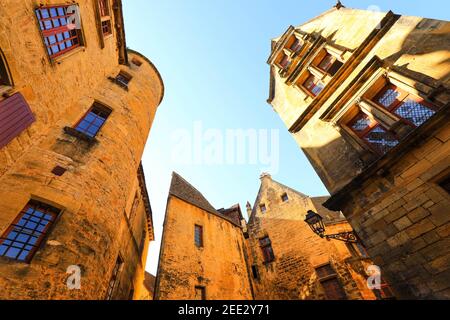 Historic medieval buildings in the old town of Sarlat (Sarlat-la-Caneda) in Preigord in the Dordogne in the Nouvelle-Aquitaine region of France. Stock Photo