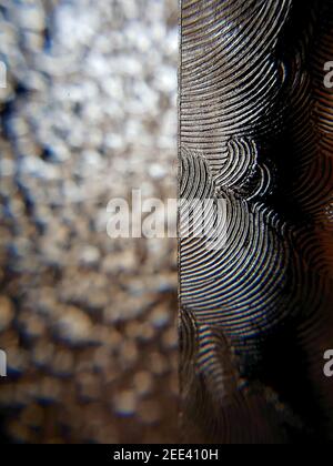 Light on the left segment is plain ground glass and the right is with a plastic film on it Stock Photo